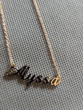 Gold toned Necklace With Name Alyssa